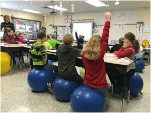 Student raising hand - Increasing student motivation