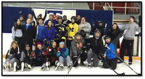 PE Class Playing Hockey