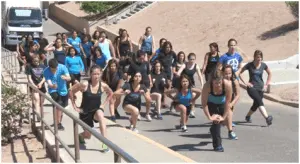 Students doing uphill lunges