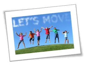 Students jumping lets move sign