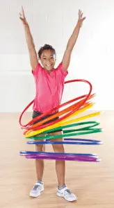 Girl playing with Hula Hoops