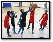 Students playing basketball