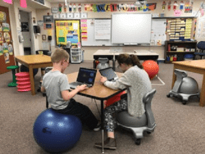 Students sitting on active seats